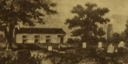 A picture of old church surrounded by a cemetery